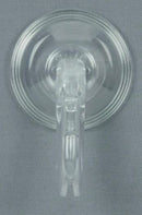 A clear plastic suction cup with a transparent clip and base, shown against a textured gray background.