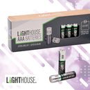 Lighthouse AAA batteries shown with their retail box and two individual batteries on a stylized white and lavender graphic background. The box reads 'LIGHTHOUSE AAA BATTERIES' and indicates a pack of 4 batteries.